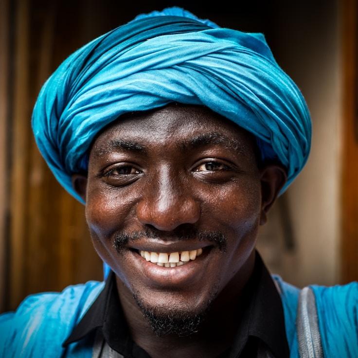 Anya Rao, Lead Design Curator at Quiet Valley Commons, reviewing corporate floral arrangements